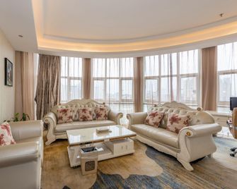 New Huatian Hotel - Ji’an - Schlafzimmer