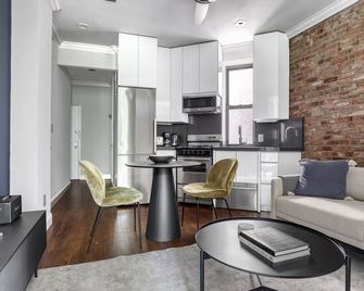 Stunning Nolita 1BR w/ W/D, near SoHo, by Blueground - New York - Living room