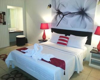 Green Palm Boutique Hotel - Scarborough - Bedroom