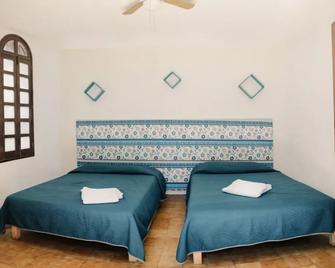 Casona Luciérnaga-Casa de Huéspedes - León - Habitación