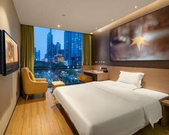 Iu Hotel Guangzhou Sports Center Lin He - Cantón - Habitación