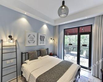 Yoyo Hotel - Beijing - Bedroom