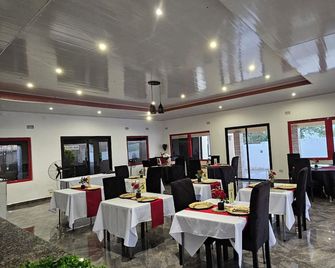 Malbon Green Executive Plus Lodge - Kafue - Restaurante