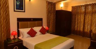 The Trivandrum Hotel - Thiruvananthapuram - Schlafzimmer
