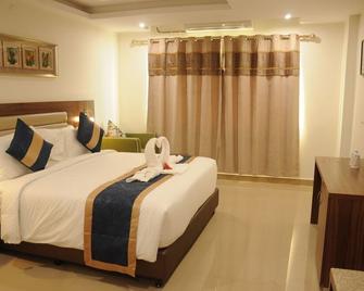 Suraj Grand Hotel - Nandyāl - Habitación