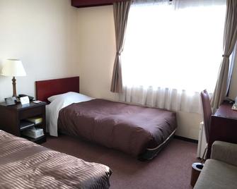 New Furano Hotel - Furano - Yatak Odası