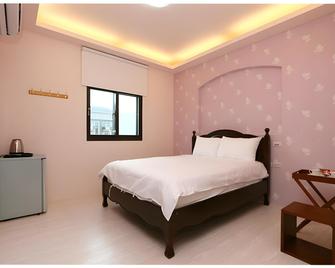 Meet Love at Pacific Ocean Turtle Island Bed and Breakfast - Yilan City - Bedroom