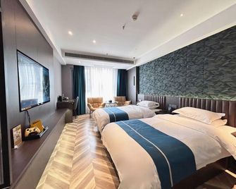 Scifi Xifei Hotel (Baoji Jintai Avenue Tangchao City Branch) - Baoji - Schlafzimmer