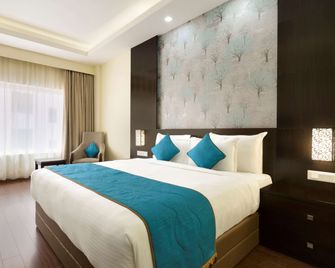 Ramada by Wyndham Jamshedpur - ג'משדפור - חדר שינה