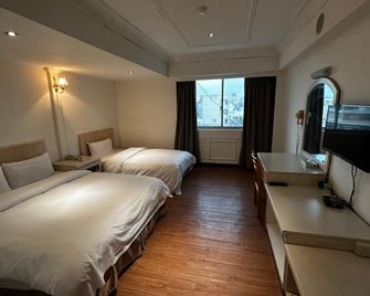 Taitung Bali Suites Hotel - Taitung City - Camera da letto