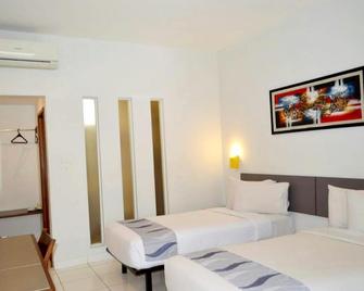 Hotel Koening - Cirebon - Schlafzimmer