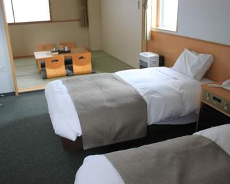 Hotel Unigoten - Rishirifuji - Bedroom