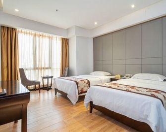 Yihao Hotel - Putian - Camera da letto