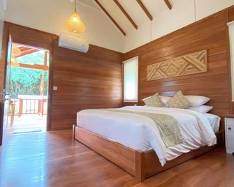 Tropik Resort Lombok - Kuta - חדר שינה