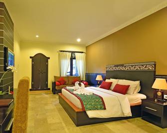 Puri Dewa Bharata Hotel & Villas - Kuta - Schlafzimmer