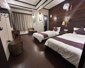 The Nettle and Fern Hotel - Gangtok - Slaapkamer