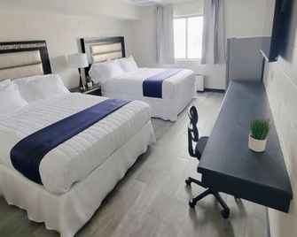 Guest Lodge - Minot - Sypialnia