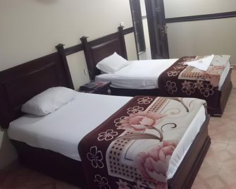 Al Noor Hotel Faisalabad - Faisalābād - Bedroom