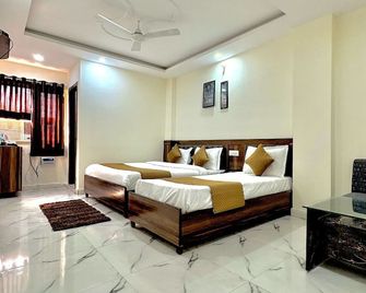 Hotel Royal Central Haridwar - 哈里瓦 - 臥室