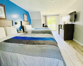Blue Spruce Motel & Townhouses - פלימאות' - חדר שינה