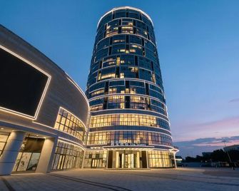 Xincheng Hotel (Yantai University International Expo Center Branch) - Янтай - Будівля