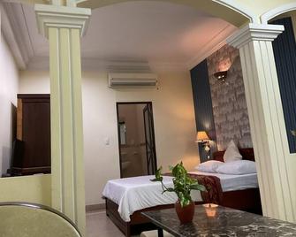 Minh Chau Hotel - Ho Chi Minh City - Bedroom