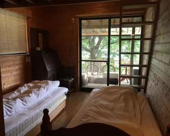 Homey Inn Enya - Yufu - Makuuhuone
