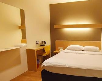 Tras Mutiara Hotel Bentong - Bentong - Ložnice