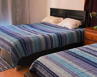 Hostal Al Yaras - Vicuña - Спальня