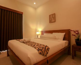 Derose Guest House - North Kuta - Phòng ngủ