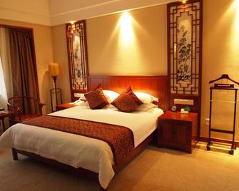 Sanqingshan Jinshawan Holiday Hotel - Shangrao - Shangrao - Bedroom
