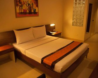 M Suites Hotel - Manila - Habitación