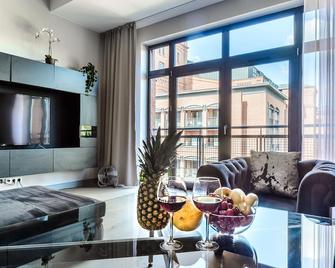 Stylish and spacious studio - Łódź - Living room