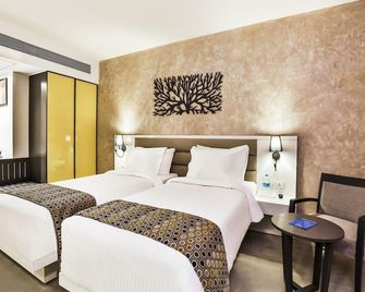 Elysia Sarovar Portico - לונאבאלה - חדר שינה