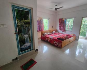 A Family Hotel in Mayapur - Nabadwip - Schlafzimmer