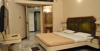 パドマ ホテル - マドゥライ - 寝室