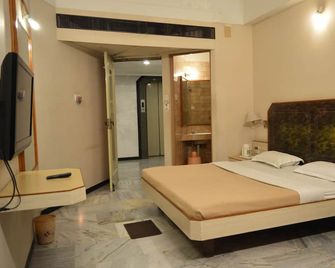 Hotel Padmam - Madurai - Ložnice
