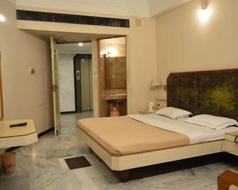 Hotel Padmam - מדוראי - חדר שינה