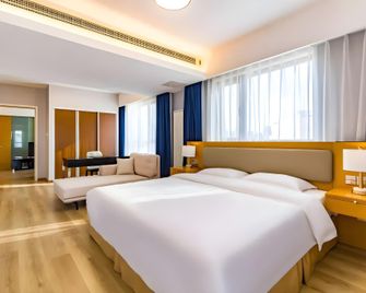 Suisse Place Tianjin - Tianjin - Quarto