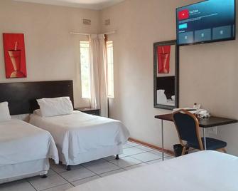 Vuya Nathi Bed & Breakfast - מנזיני - חדר שינה