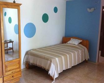 Tibambari - Blue bay - Bedroom