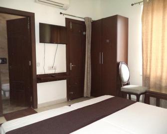 Hotel Laxmi Palace - Narendranagar - Habitación