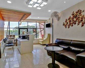 Treebo Punarnava Bypass Road - Chikamagalur - Living room