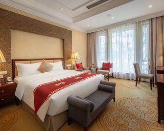 Xichang Qionghai Hotel - Ляншань - Спальня