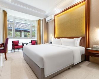 Shibabudao Hotel - Chengdu - Bedroom