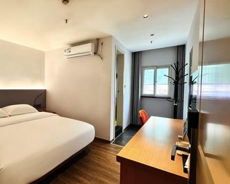 Home Inn Guangzhou Baiyun Airport Renhe Street - Guangzhou - Bedroom