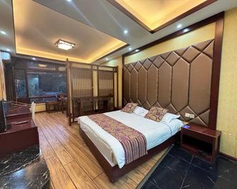 Ya'an Changshou Hotel - Ya'an - Bedroom