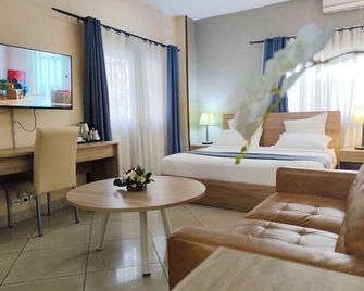 داون تاون هوتل - انتاناناريفو - غرفة نوم