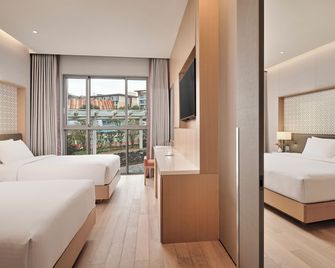 Landing Jeju Shinhwa World Hotels & Resorts - סאוגוויפו - חדר שינה