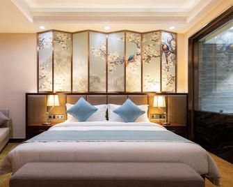 Jinshang Hotel - Chengdu High-tech Zone Zhangjiasi Metro Station Branch - Chengdu - Schlafzimmer